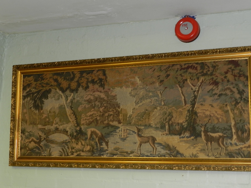An early 20th century woven tapestry in the 18th century taste study of a romantic landscape with