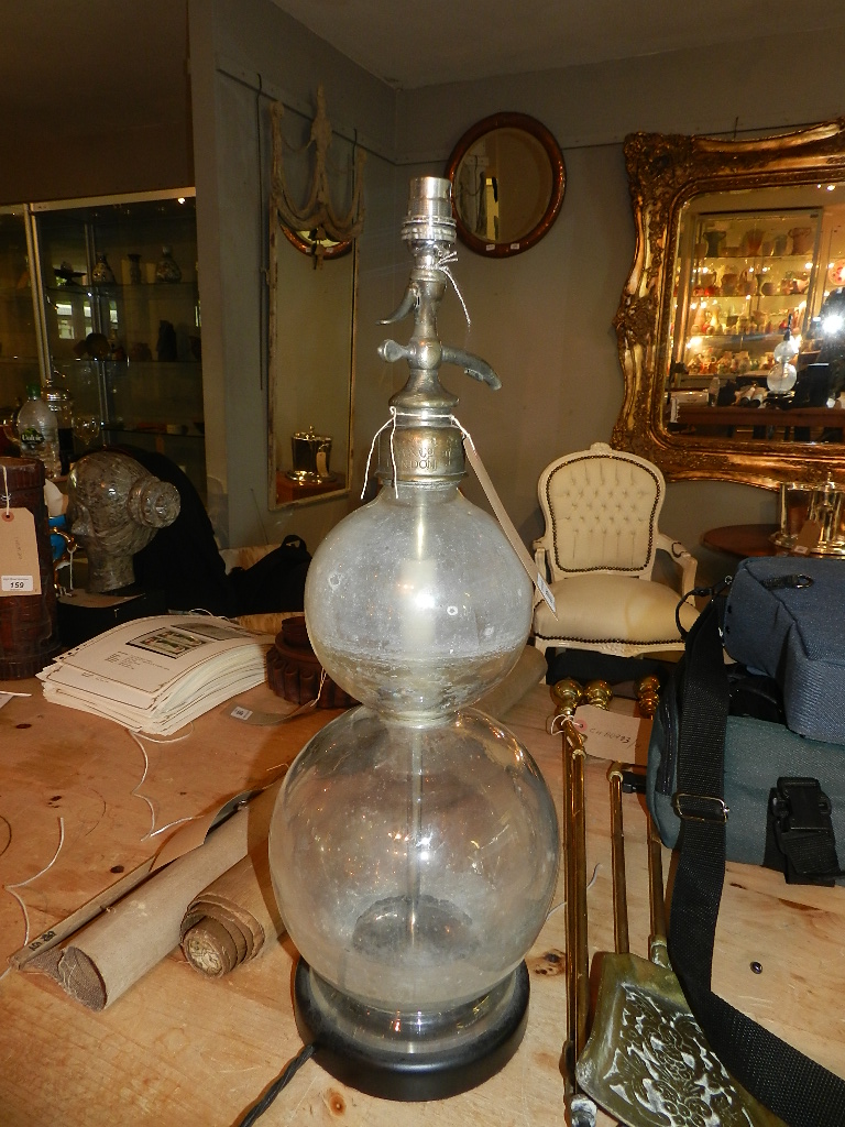 An unusual novelty early 20th century soda syphon glass table lamp, modified. H.55cm