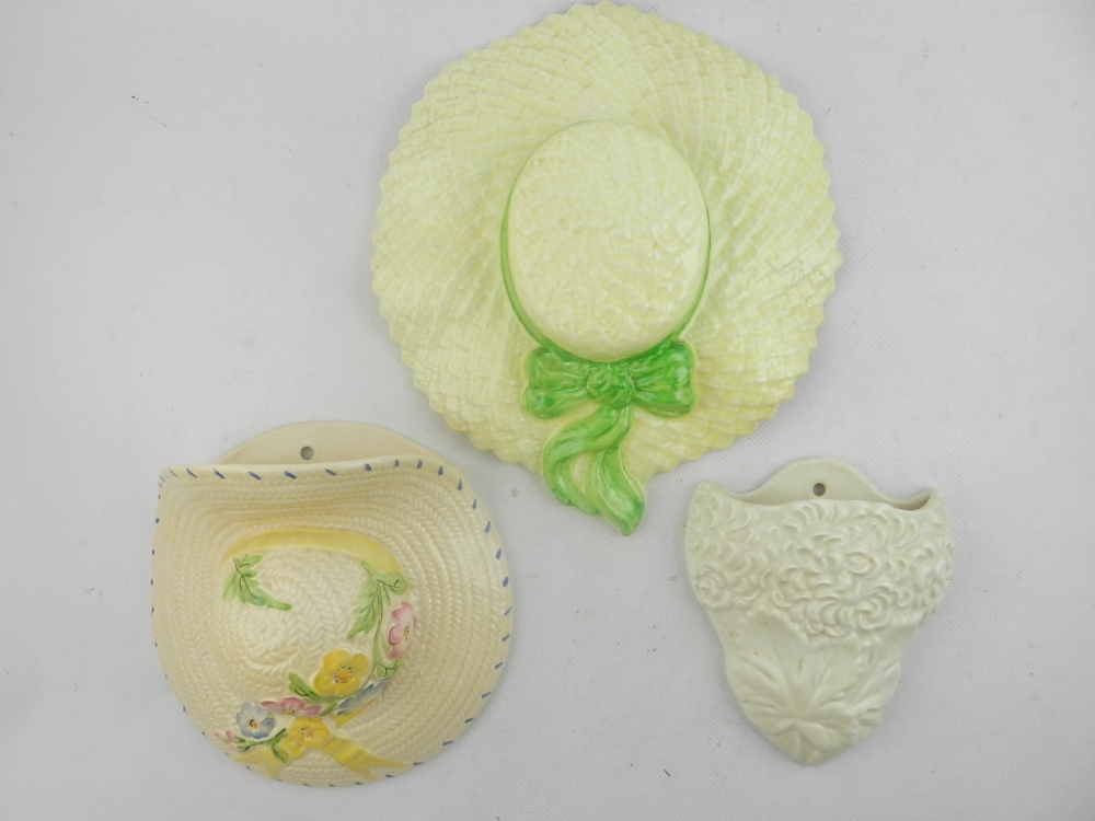 A Simpsons pottery 'Solian ware' wall pocket, fashioned as a floral bonnet. H: 18cm together with