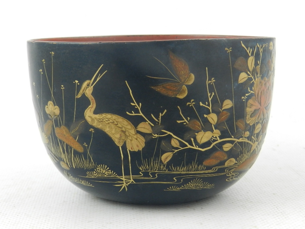 A Meiji period Japanese papier mache Hirimaki bowl, decorated with botanical studies of birds