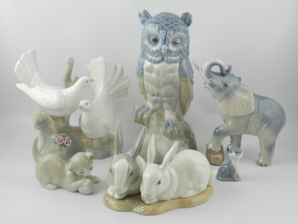 Six Spanish porcelain animalia groups, to include rabbits, doves etc.