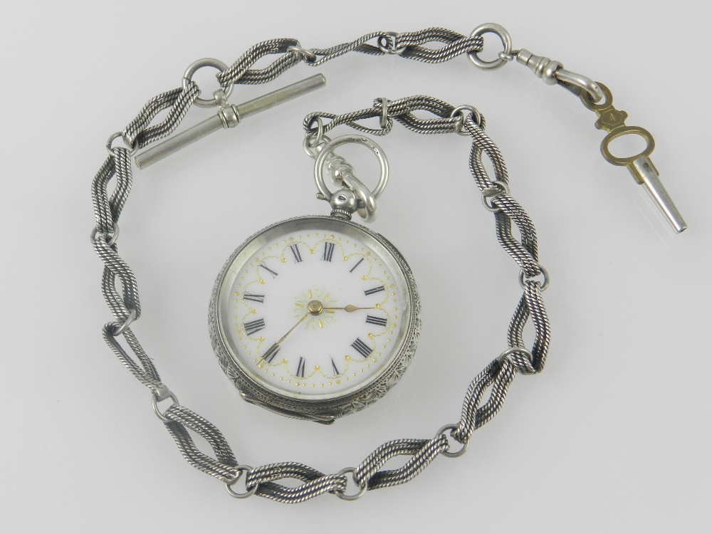 A late 19th century Swiss silver cased fob pocket watch with foliate bright cut engraved case,
