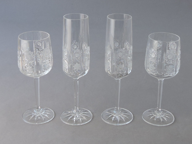 A suite of cut glass for six place settings, including two wines, and champagne, together with set