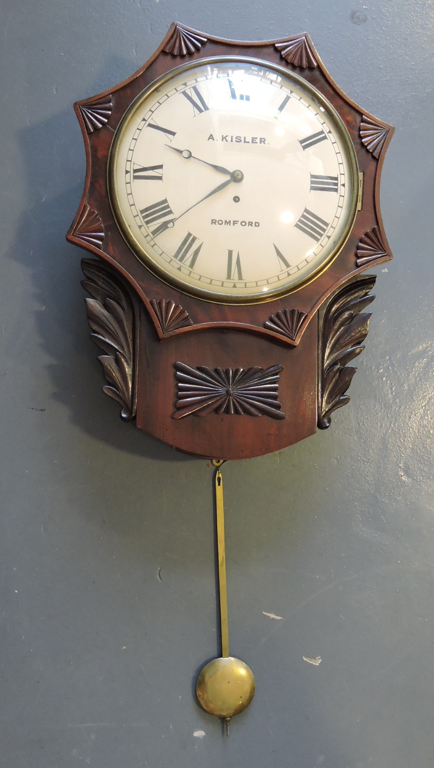 A mid Victorian mahogany drop dial wall clock with fusee movement, concave circular white dial