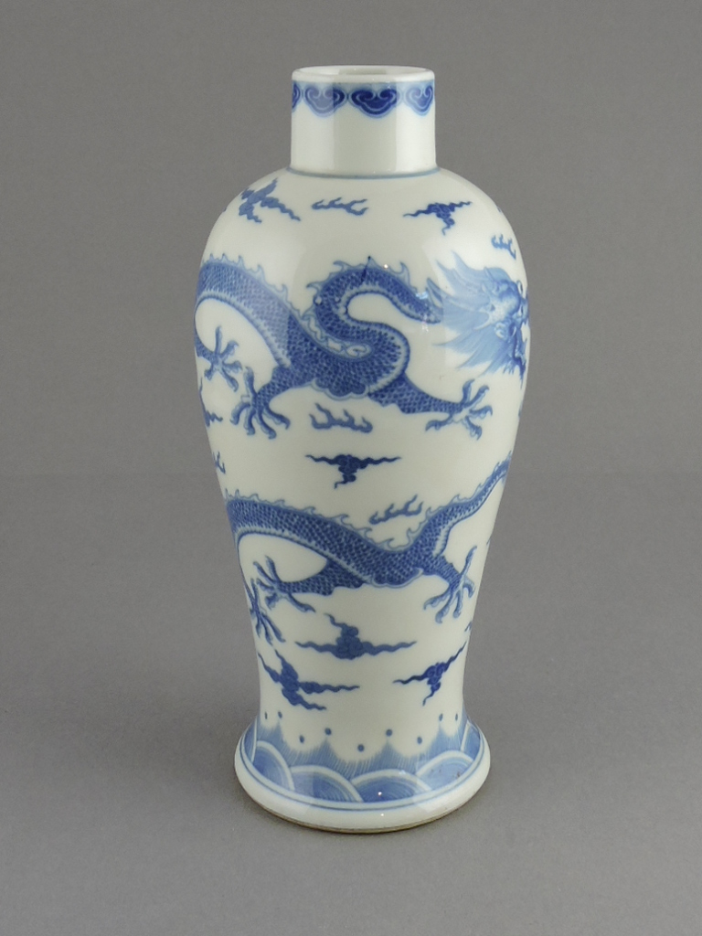 A Chinese blue and white porcelain vase of inverted baluster form decorated with dragon and pearl