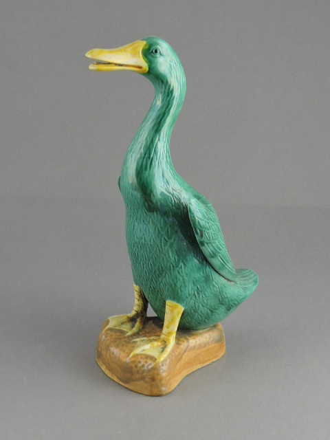 A Chinese glazed earthenware model of a standing duck blue and yellow glazed, H. 26cm.