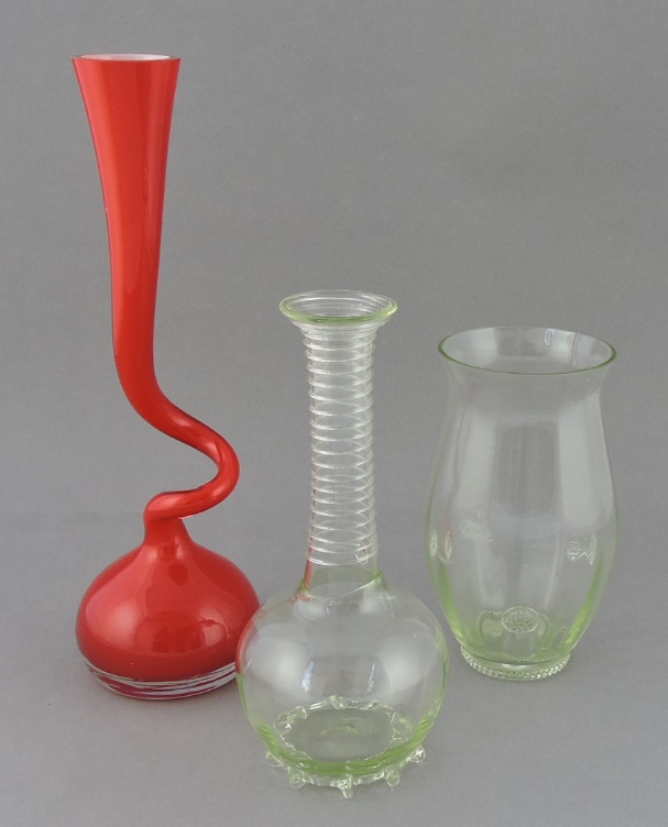 A 20th century art glass vase, with a ribbed long narrow neck, the base engraved PK, together with a