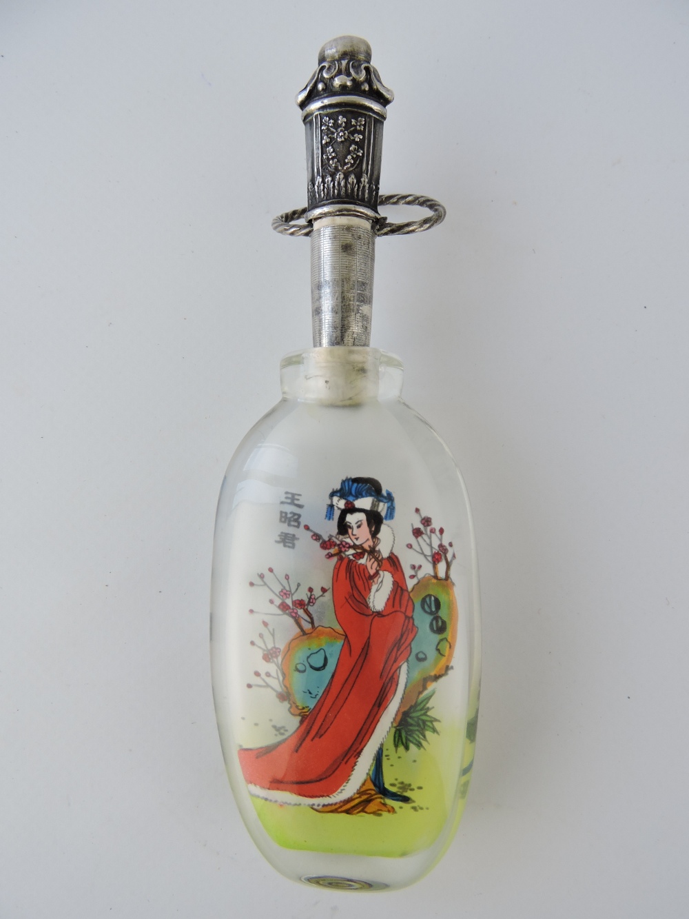 A 20th century Chinese interior painted snuff bottle, the decoration showing lute player with an