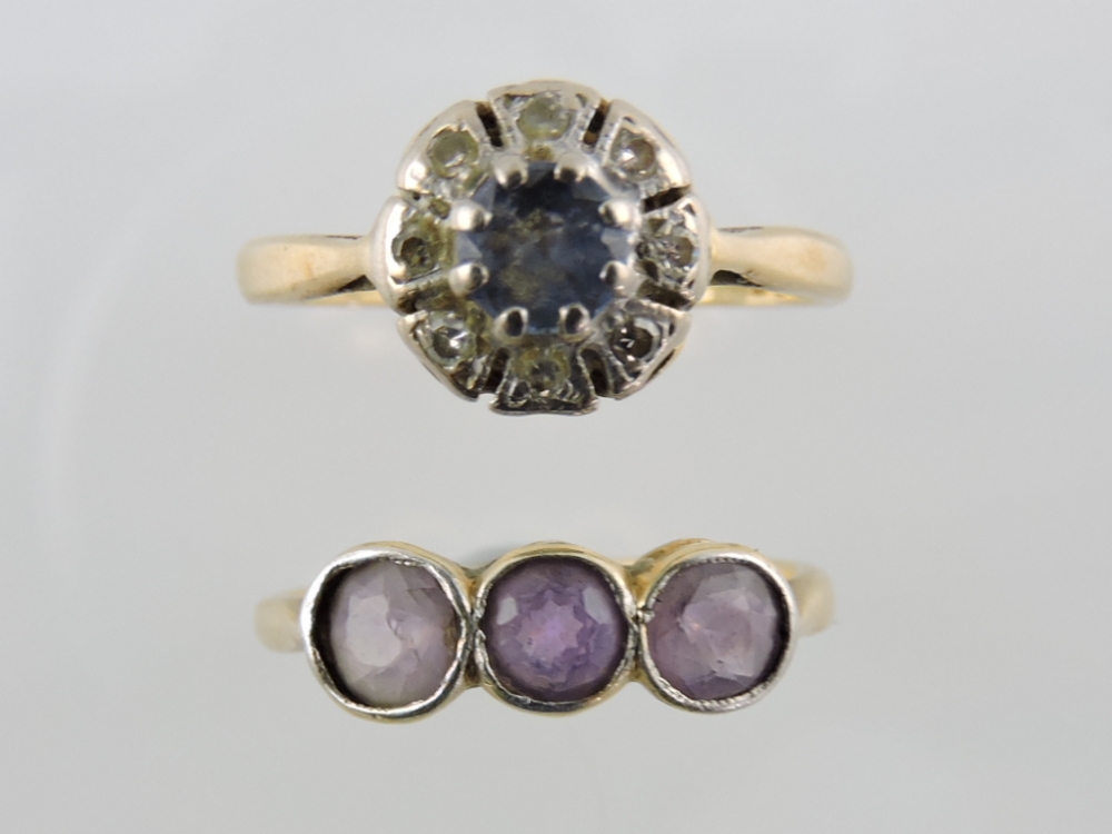 An 18ct sapphire and diamond ring and an 18ct amethyst ring with rub over set.