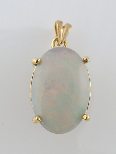 A large opal pendant, with red/green fire, claw-set in yellow metal, 7.4g