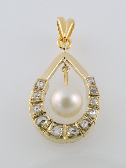 A natural pearl pendant, set within an articulated band or rose-cut diamonds, in yellow metal.