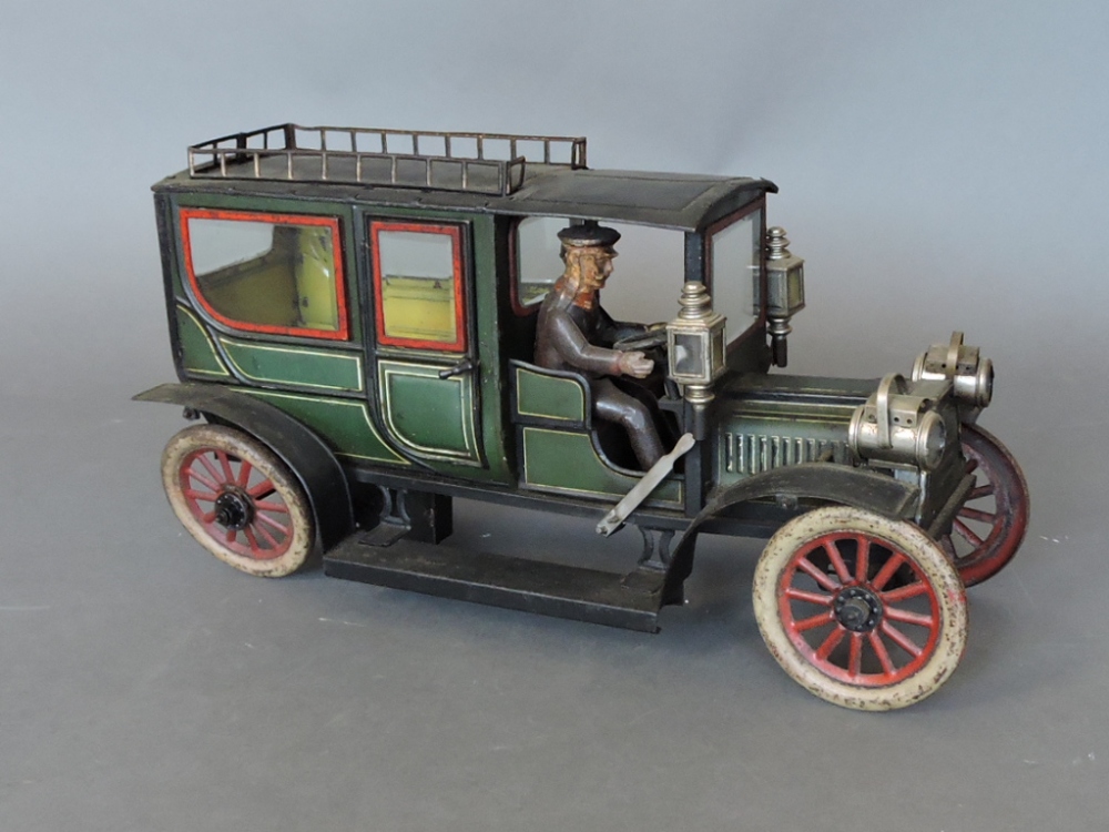 An Edwardian lithographed tinplate limousine by George Carette, possibly of a Mercedes vehicle,