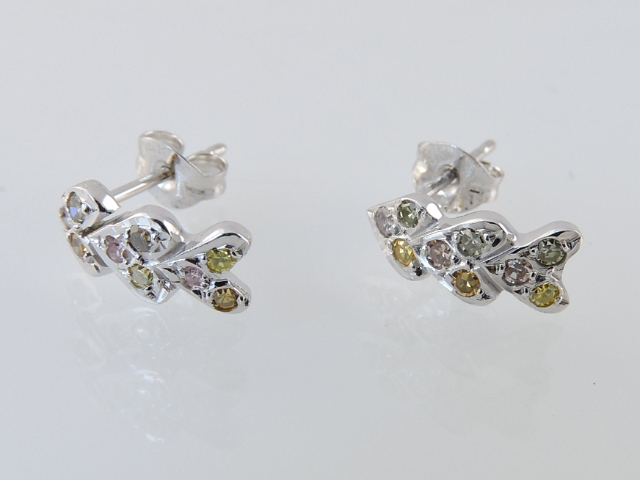 A pair of fancy diamond set ear studs, in blues, greens and yellows, in a white metal setting, 1.