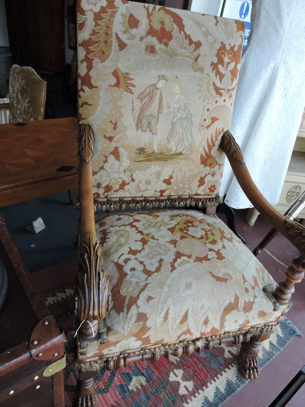 A pair of 18th Century design Italian style walnut open armchairs with tapestry seats and backs,