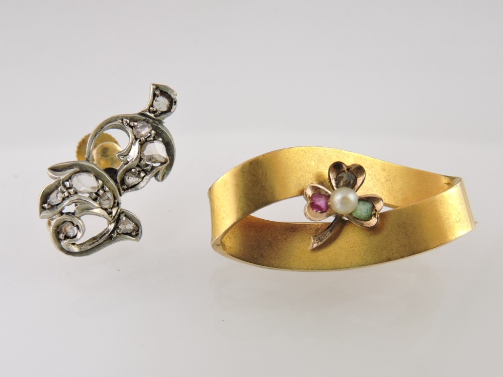 A ribbon brooch set with a pearl-centred shamrock, the clasp stamped 9c; together with an old-cut