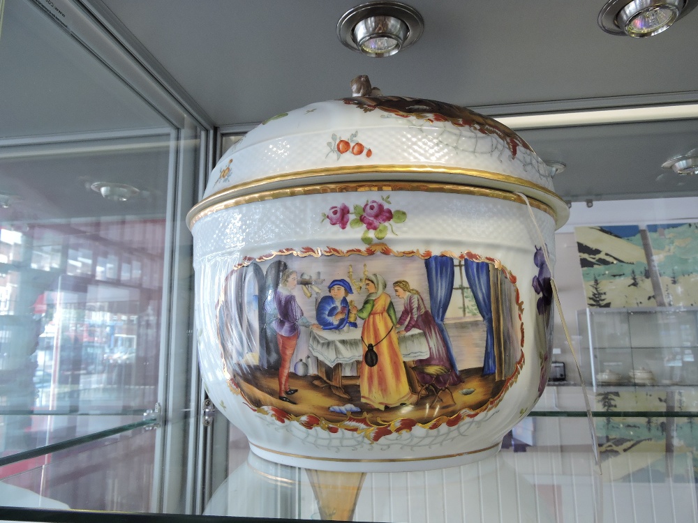 A large Meissen style porcelain jar with figural, fruit encrusted cover the spiral moulded body