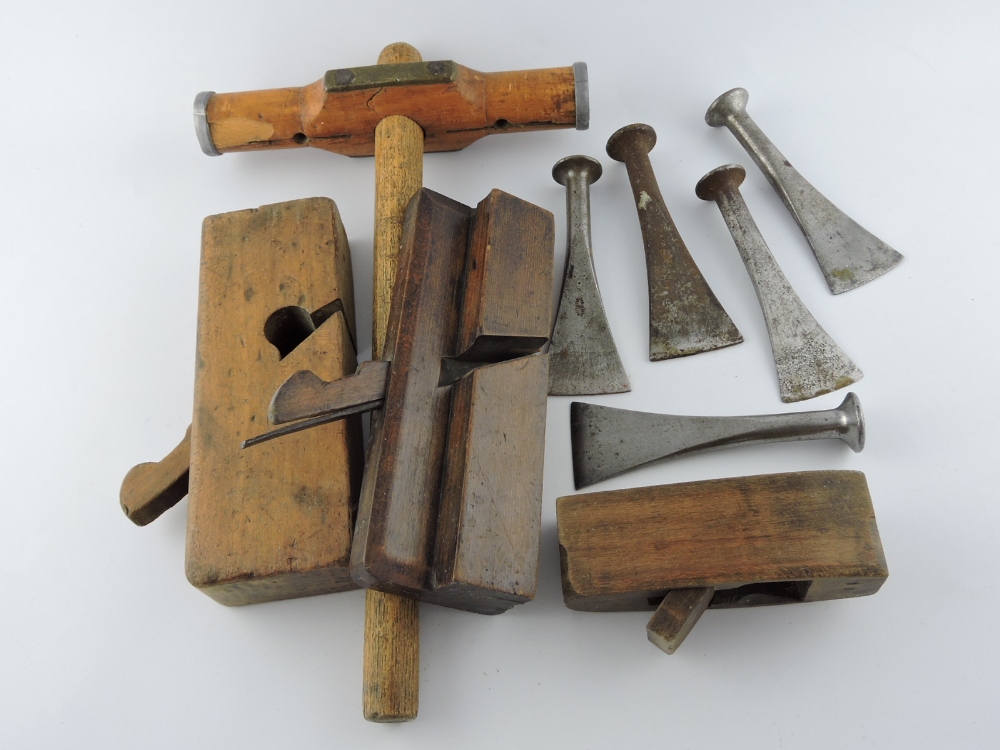 A collection of nine 19th century and later shipwrights tools comprising iron mounted Caulking