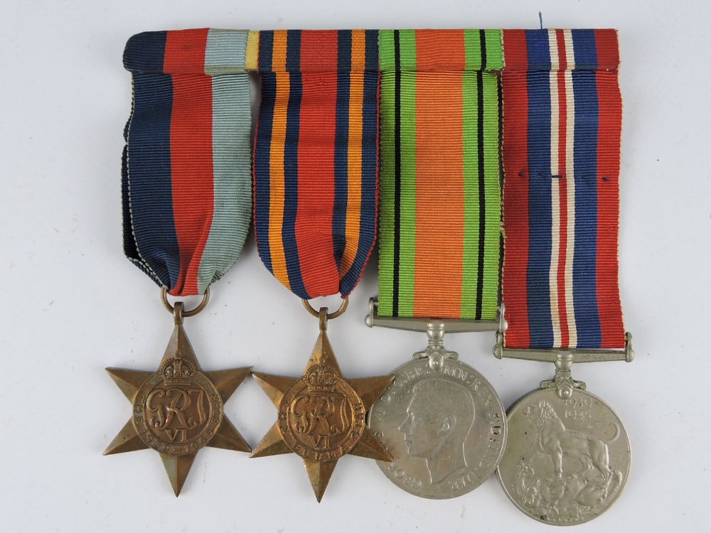 A four piece WWII medal group comprising 1939-45 star, Bruma star, Defence medal and 1939-45