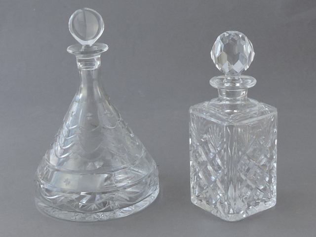 A cut glass crystal ship's decanter, by William Yeoward, with a star-and-wave design, the base