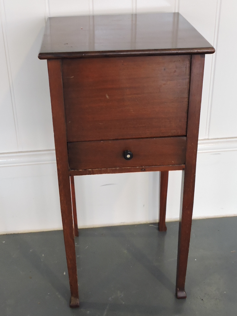 A 1920's mahogany sewing box with hinged top over compartmented drawer on square tapered legs W