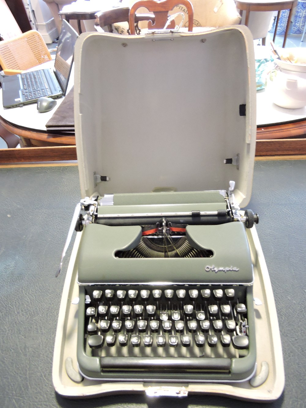 A cased Olympia typewriter, circa 1960.