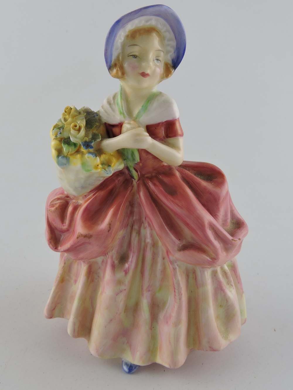 A Royal Doulton porcelain figurine, Cissie, HN1809, H. 13cm.