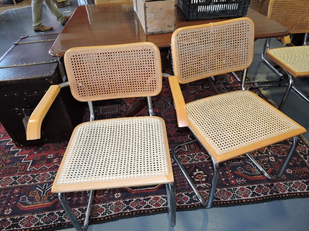 After Marcel Breuer, four S32 type cantilever chairs, in light beech with cane back and seat,