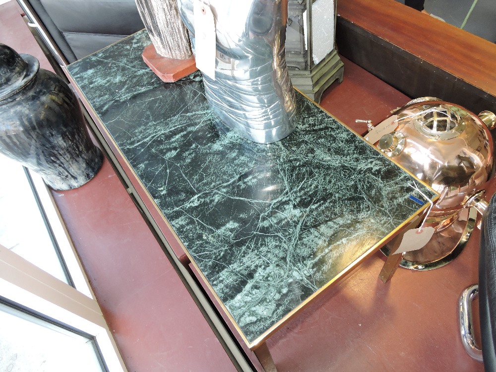 **WITHDRAWN**
A brass framed rectangular coffee table, with reconstituted green marble top, L.