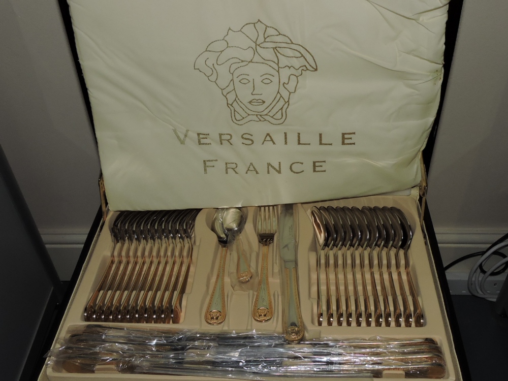 A cased Versailles 83-piece plated canteen cutlery, setting for 12.