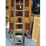 A vintage pine 16-rung two section extending ladder.