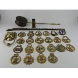 A small quantity of brassware, including horse brasses, door knocker and a chestnut roaster.