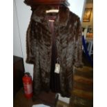 A ladies three quarter length fur coat,