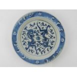 A Chinese blue and white plate, depictin