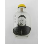 A Chinese reverse painted glass snuff bo