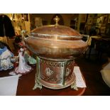 A brass mounted copper brazier. H: 45cm