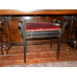 An early 20th century box-seat piano sto