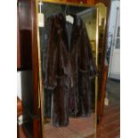 A ladies three quarter length fur coat