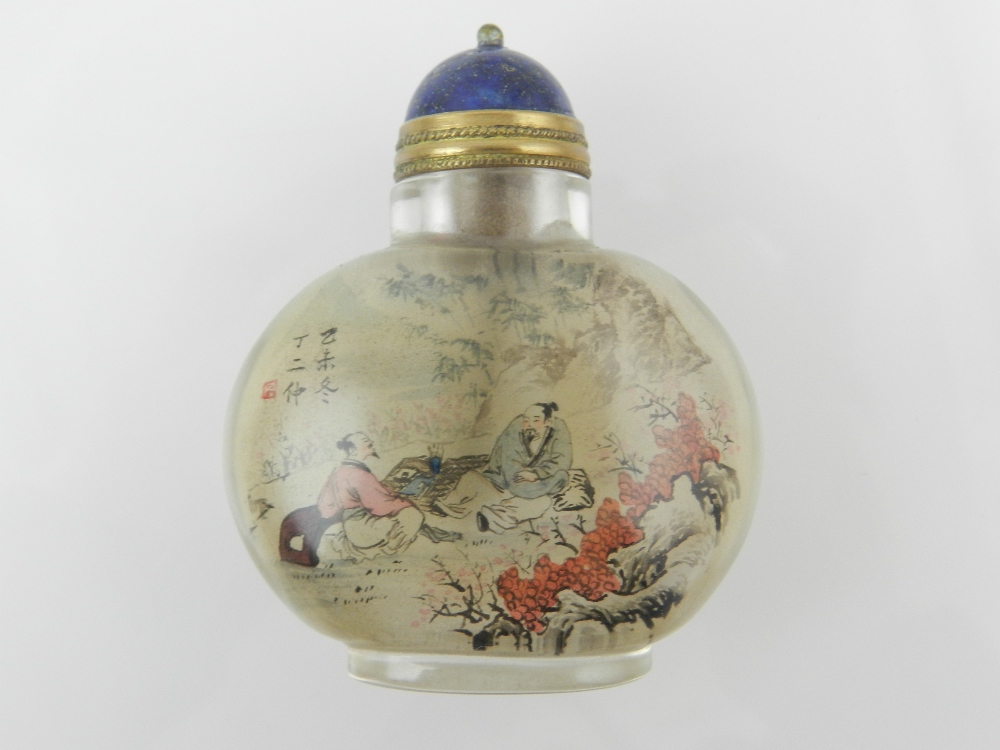 A Chinese reverse painted glass snuff bo