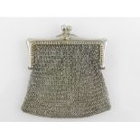 A silver plated coin purse.