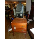 A oak dressing chest, having two drawers