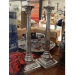A pair of silver plated Corinthian form