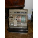 An N.C.R. national cash register.