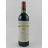 A bottle of Chateau Mouton Rothschild, 1