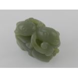 A Chinese green jade paperweight, depict