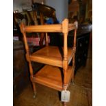 A Regency style three tier yew wood what