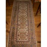 A Persian style cream ground carpet, dec