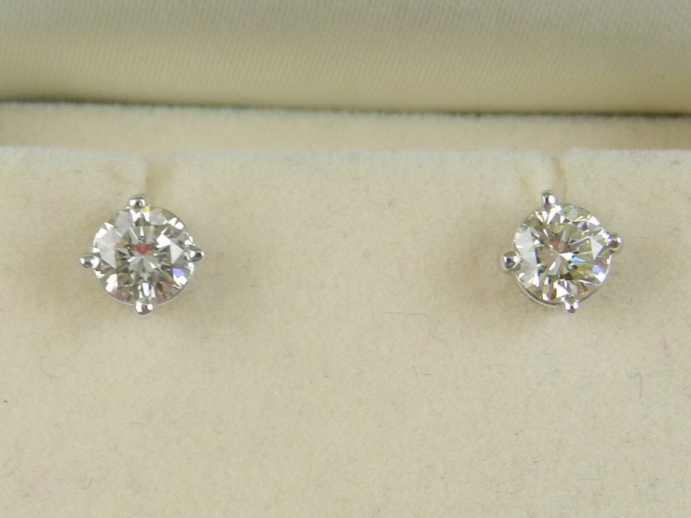 A pair of 14 carat white gold and diamon - Image 2 of 2