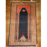 A Persian prayer mat, the red and blue g