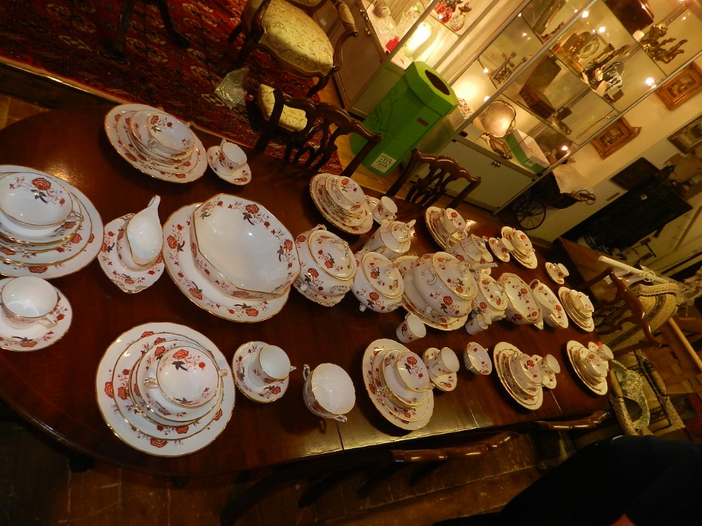 A Royal Crown Derby dinner and tea service, 'Bali' pattern, comprising 12 dinner plates, 12 sandwich