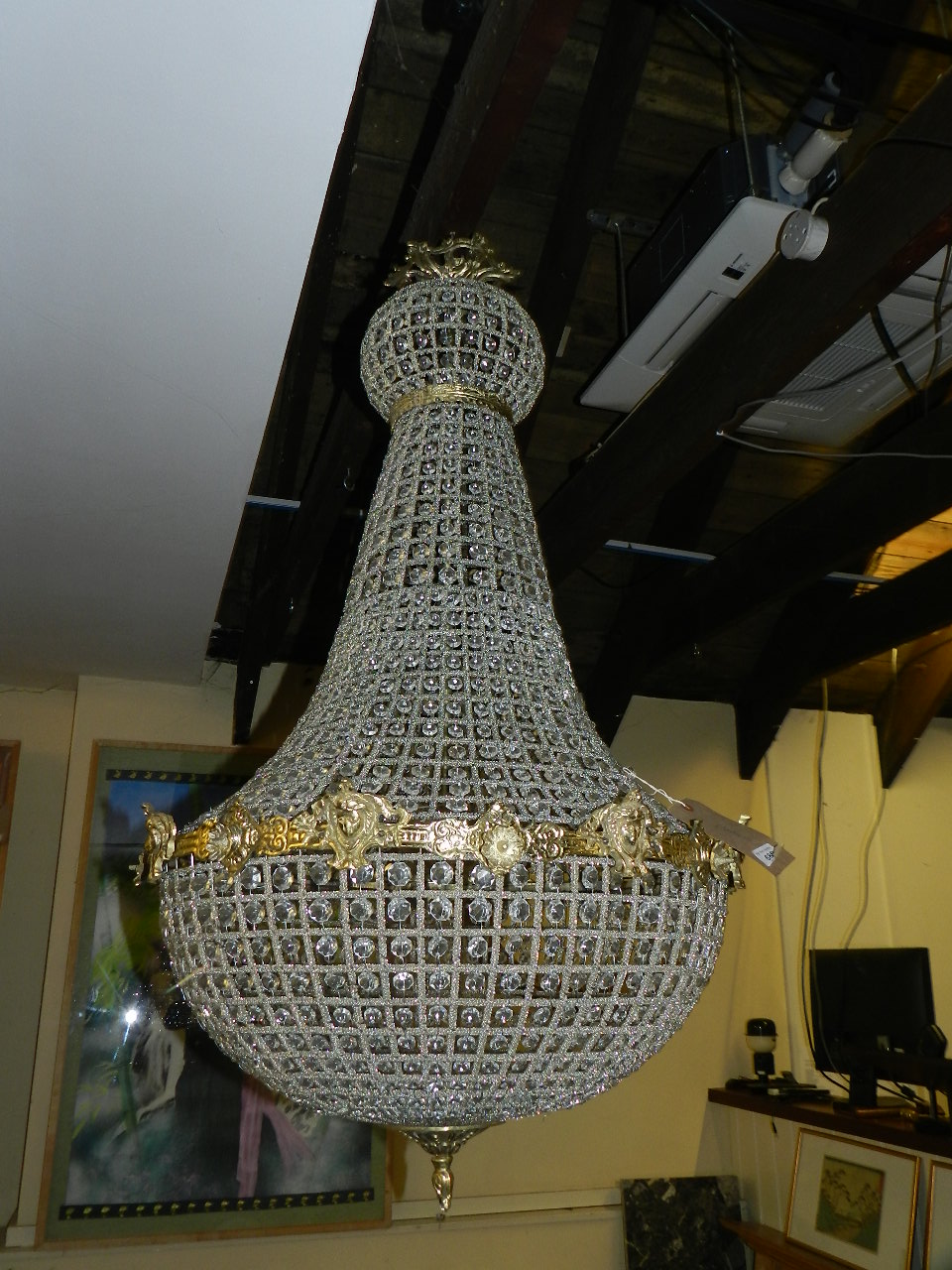 A French glass mounted gilt metal chandelier of basket form.